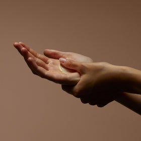 Aesop hand application in use showing balm massage for conditioned cuticles benefit