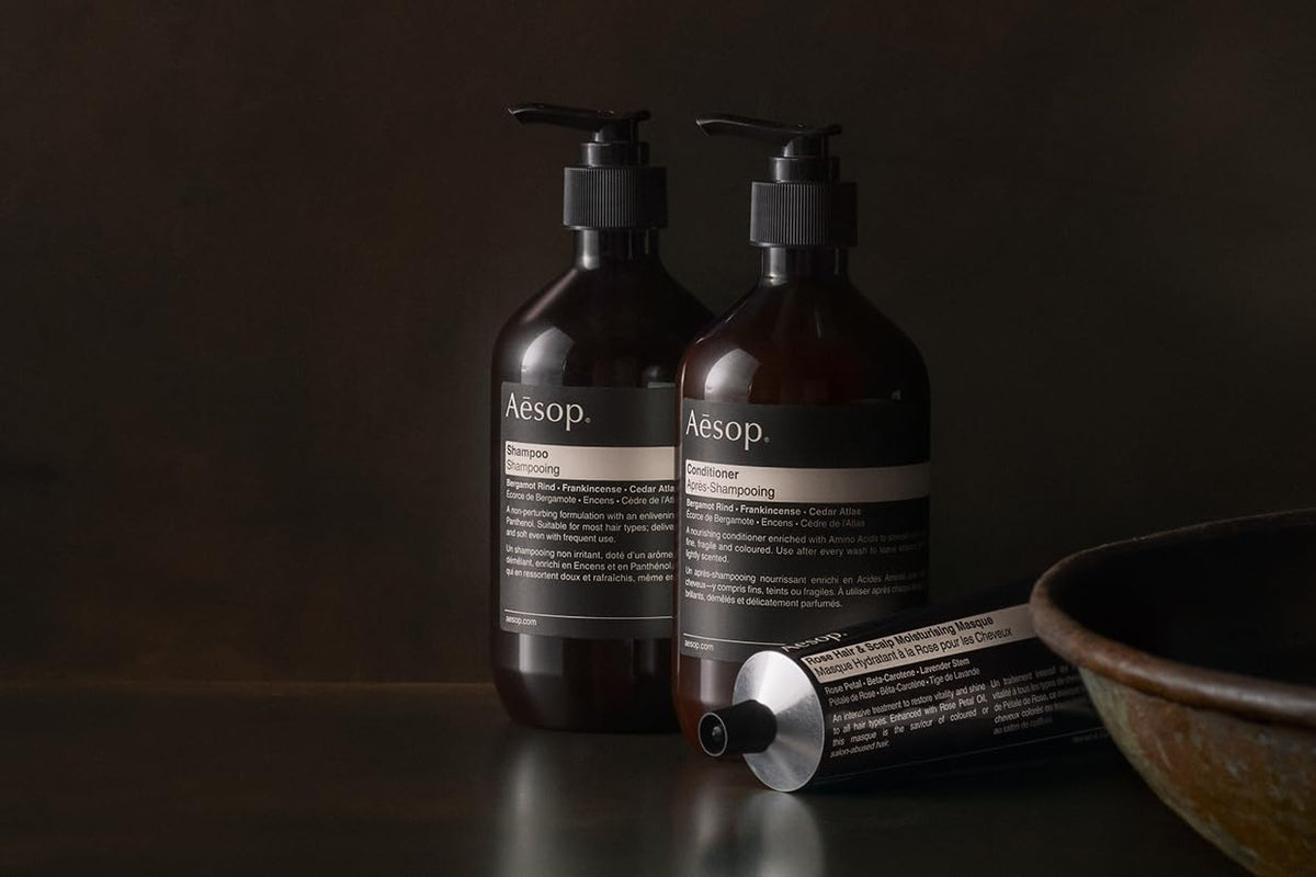 Arrangement of bergamot rind and frankincense with Aesop to show natural scent ingredients benefit
