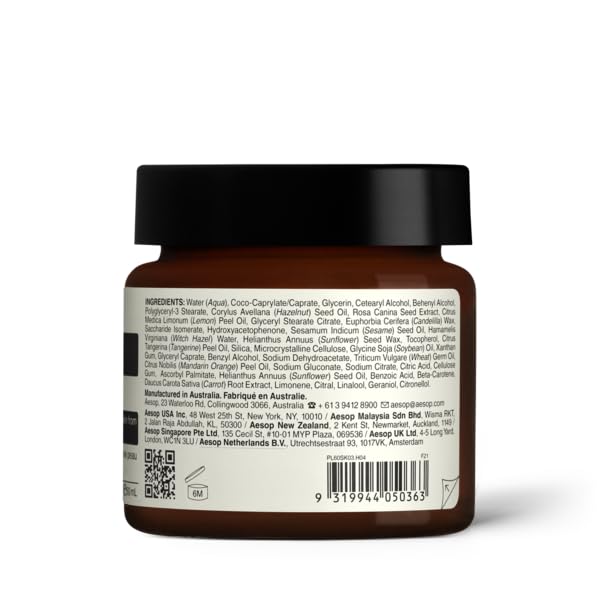 Aesop jar next to coin for scale, clarifies 60 mL size comparison
