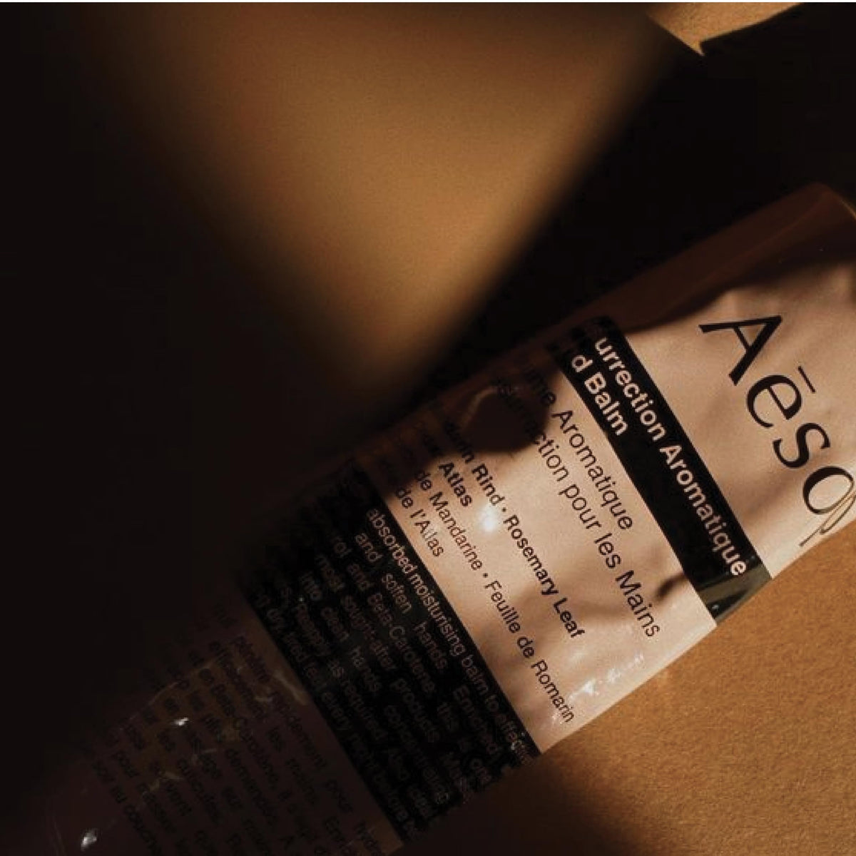 Aesop recycled aluminium tube label highlighting sustainable packaging benefit