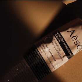 Aesop recycled aluminium tube label highlighting sustainable packaging benefit