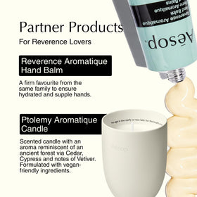 Aesop Reverence Aromatique bottle staged in a bathroom setting suggesting daily ritual and sensory benefit