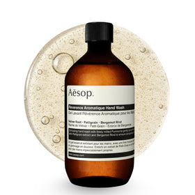 Aesop refill pouch front view showing product packaging and convenient refill use