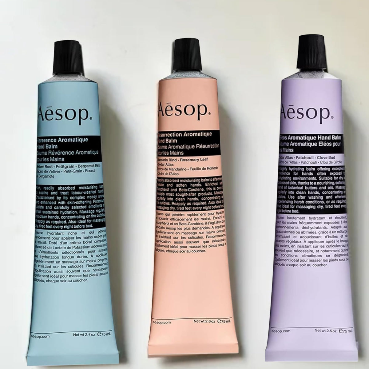 Aesop tube beside hand for size comparison illustrating travel-friendly portability