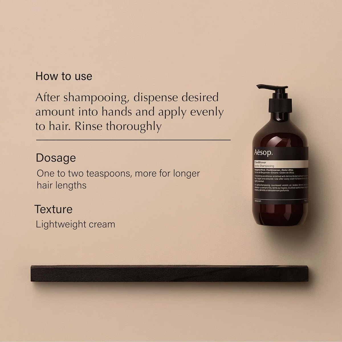 Aesop shampoo foam on hand demonstrating lather and gentle cleansing