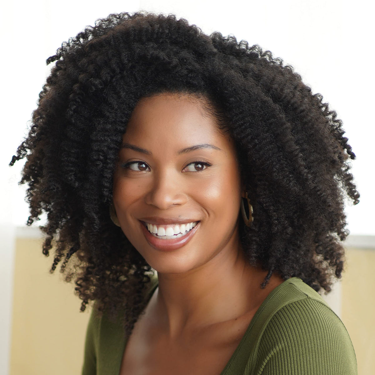 African Pride bottle on bathroom shelf lifestyle image promoting routine use