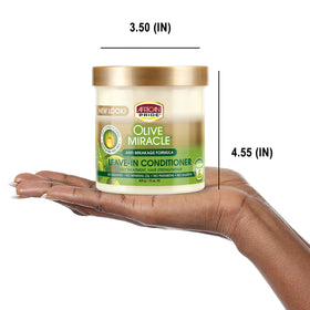 African Pride applying leave-in crème to damp hair for easier detangling