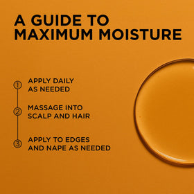 African Pride oil being applied to scalp to soothe itchiness and refresh skin