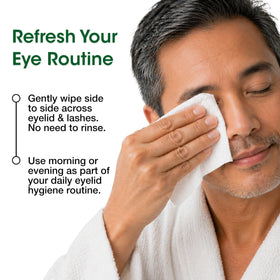 AFT Opti-Soothe wipe in hand being used along lash line for quick, no-rinse cleansing