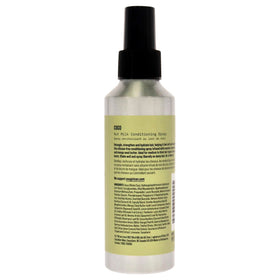 AG Care COCO spray in use misting hair for easier detangling and shine