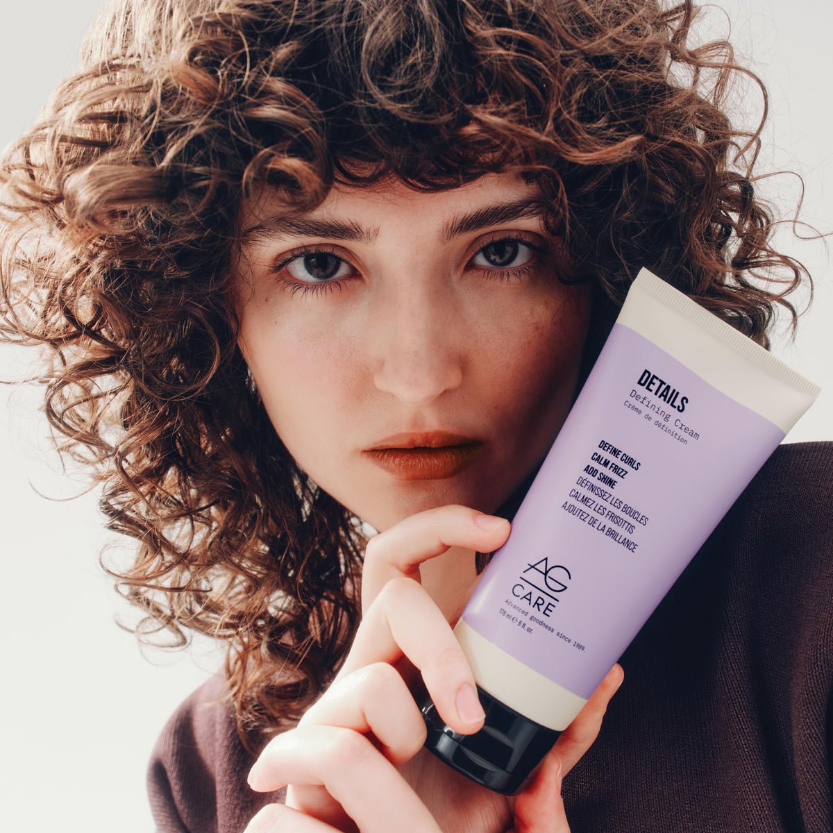 AG Care finished shiny curls showcasing defined, frizz-reduced hair
