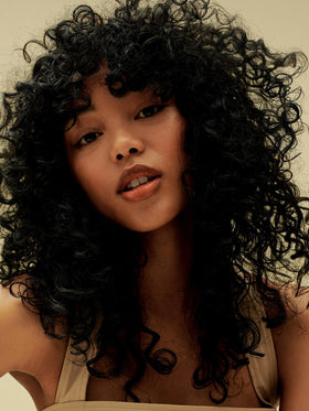AG Care Curl Fresh shampoo texture on hand demonstrating gentle hydration