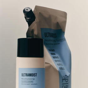 AG Care Ultramoist on bathroom counter styled scene suggesting daily routine and moisturized results
