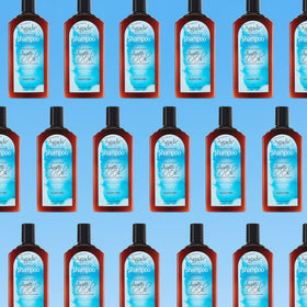Agadir shampoo bottle held in hand showing 12.4 fl oz scale benefit