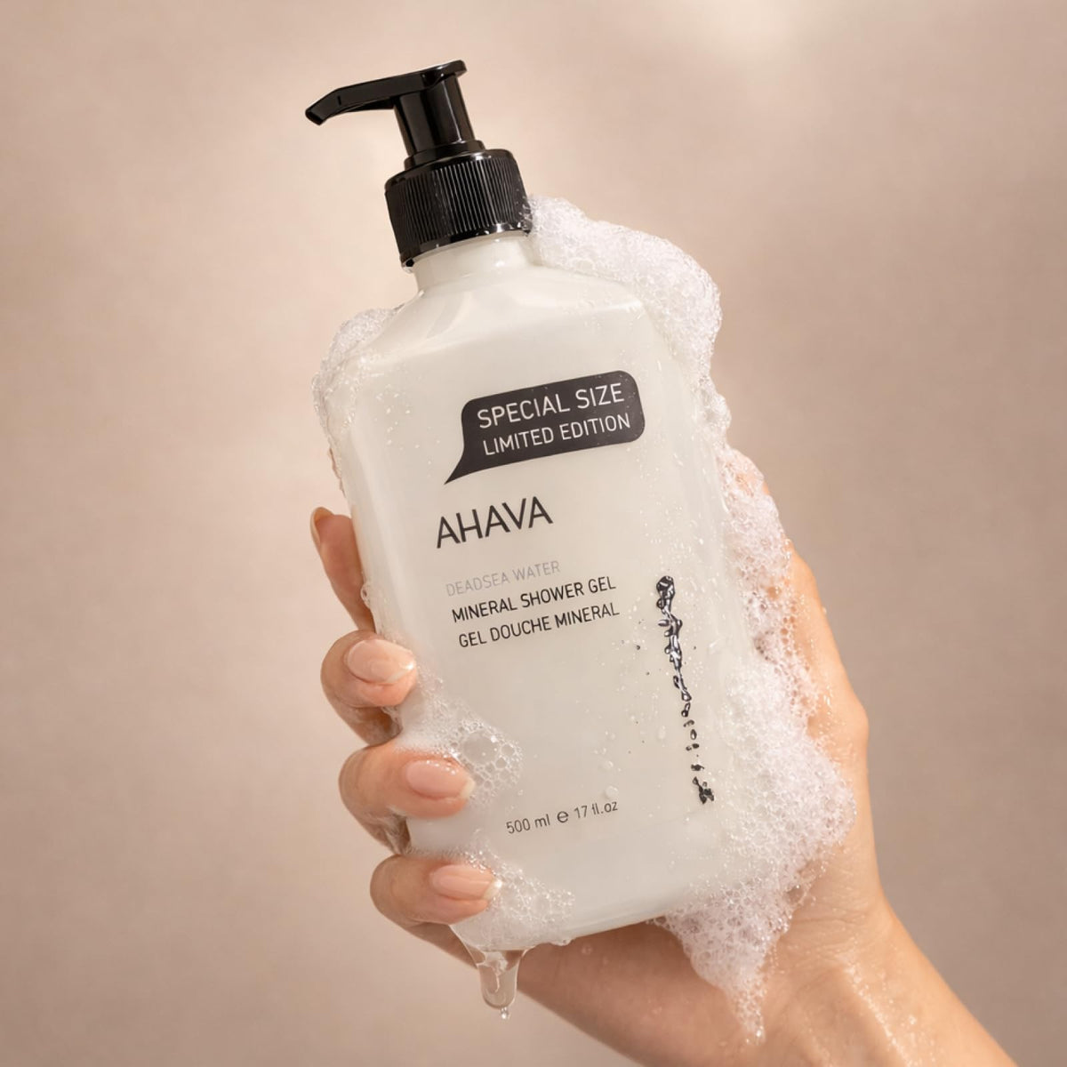 AHAVA 17 fl oz bottle next to a common object showing travel and size benefit