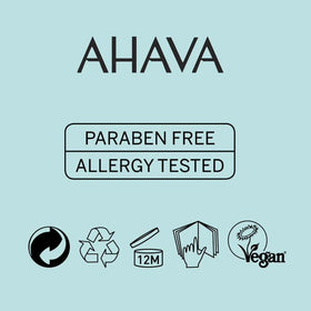 AHAVA 3.4 oz bottle beside common items for size comparison