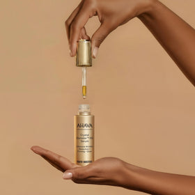 AHAVA applying Crystal Osmoter X6 to neck and décolleté for firmer appearance