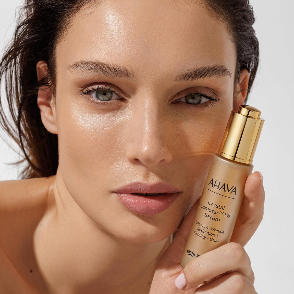 AHAVA dropper pipette dispensing serum illustrating precise application