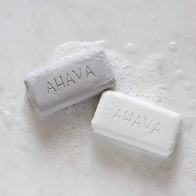 AHAVA close-up of a single Dead Sea salt soap bar highlighting mineral texture