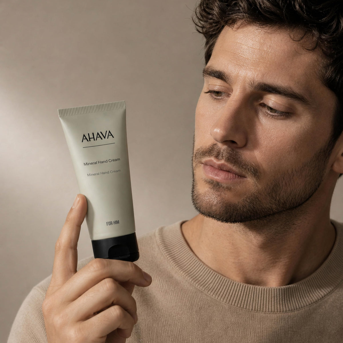 AHAVA tube next to keys and phone showing travel-friendly benefit