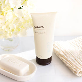 AHAVA gel on loofah in shower demonstrating effective cleansing benefit