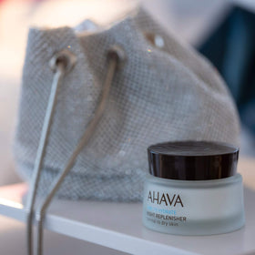 AHAVA open jar cream texture displaying rich velvety moisture