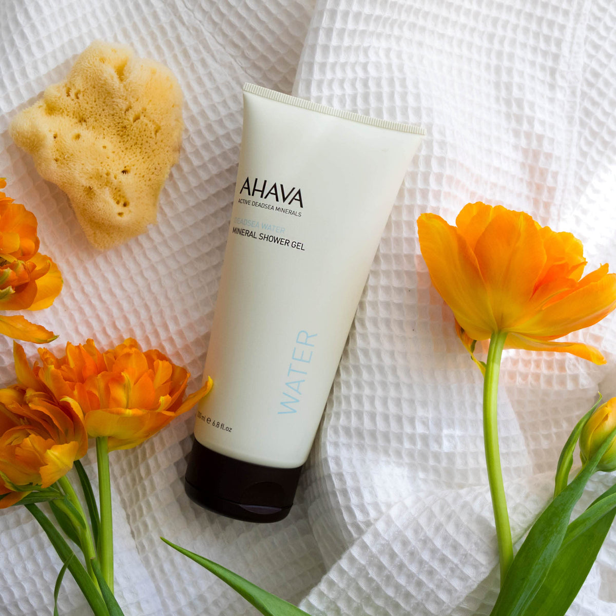 AHAVA bottle in hand showing travel-friendly, portable benefit