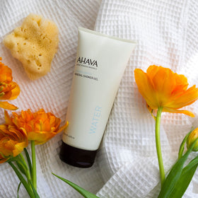 AHAVA bottle in hand showing travel-friendly, portable benefit