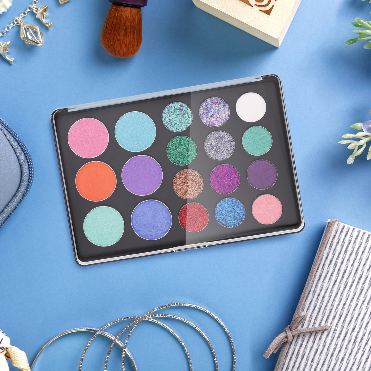 AJLTPA palette inside a makeup bag showing travel-ready organization and portability