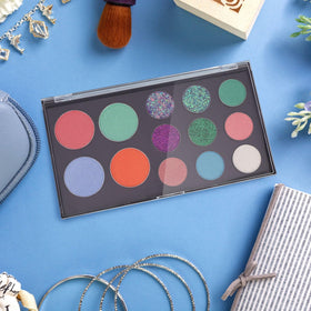 AJLTPA size comparison in hand illustrating compact palette dimensions and portability