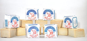 Al-Jamal soap close-up texture showing firm olive-oil bar and natural surface