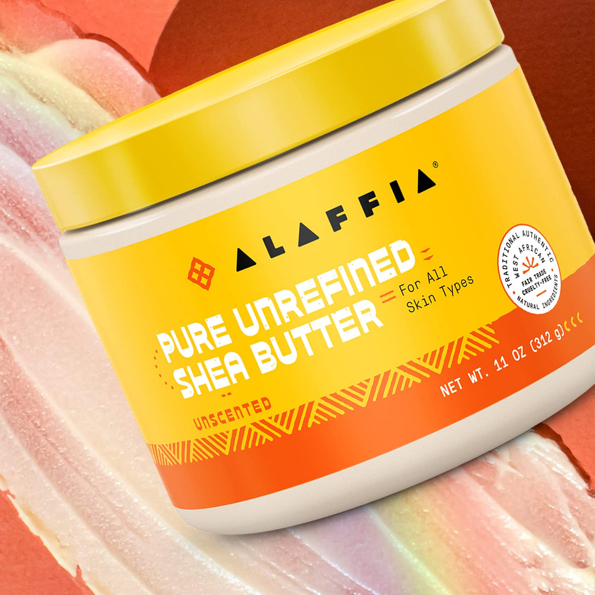 Alaffia shea butter warmed on hands for easy application and fast absorption