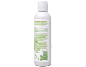 Two-pack Alba Botanica beside a ruler showing 6-ounce scale and travel-ready benefit