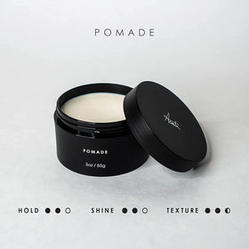 Alex Costa product in hand being warmed to activate pliable hold and restyling ability