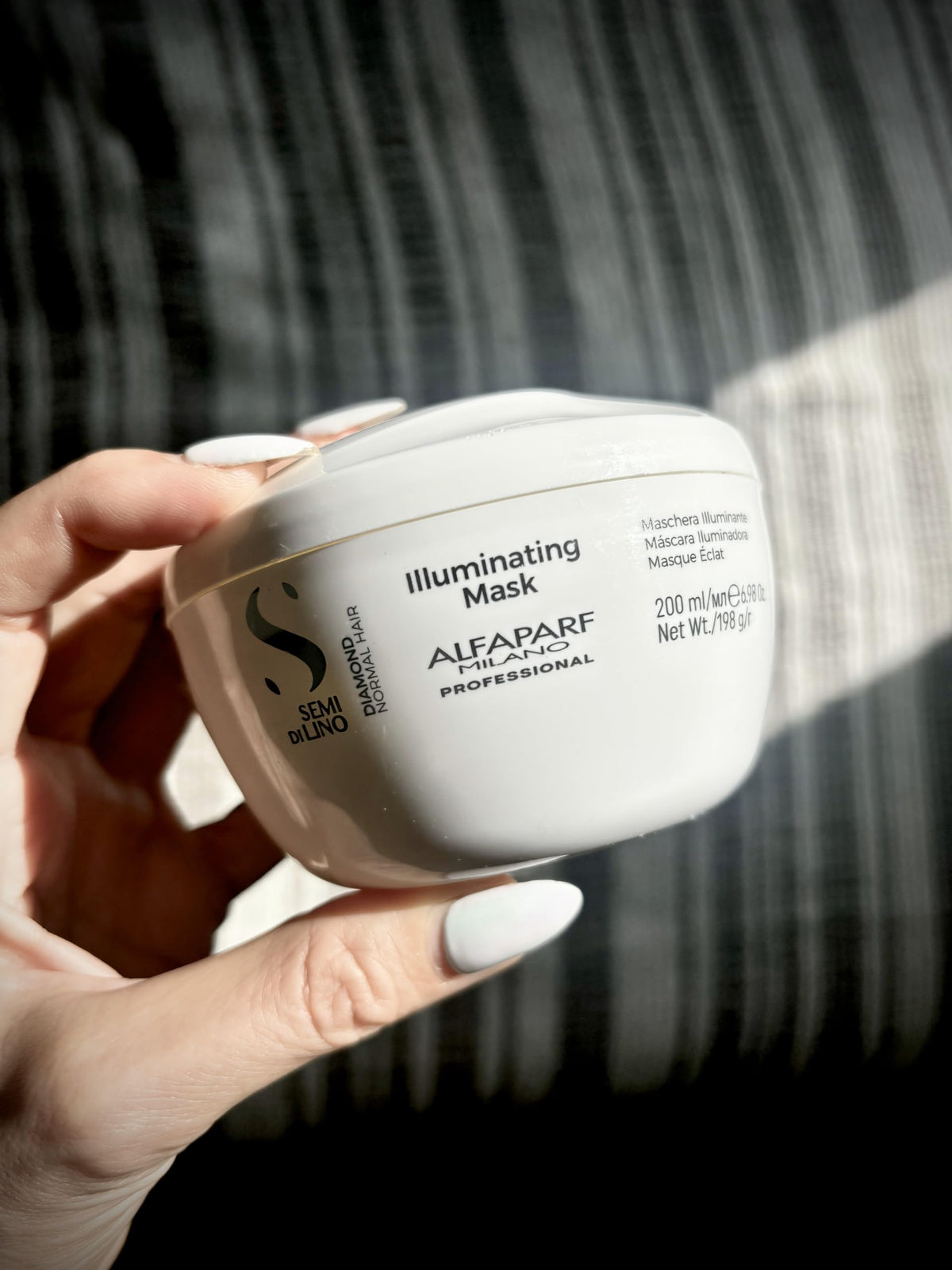 Alfaparf Milano jar label and cap detail highlighting ingredient claims