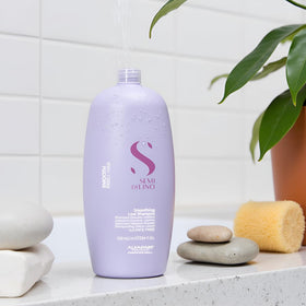 ALFAPARF MILANO 33.8 oz bottle shown for scale and salon-size refill