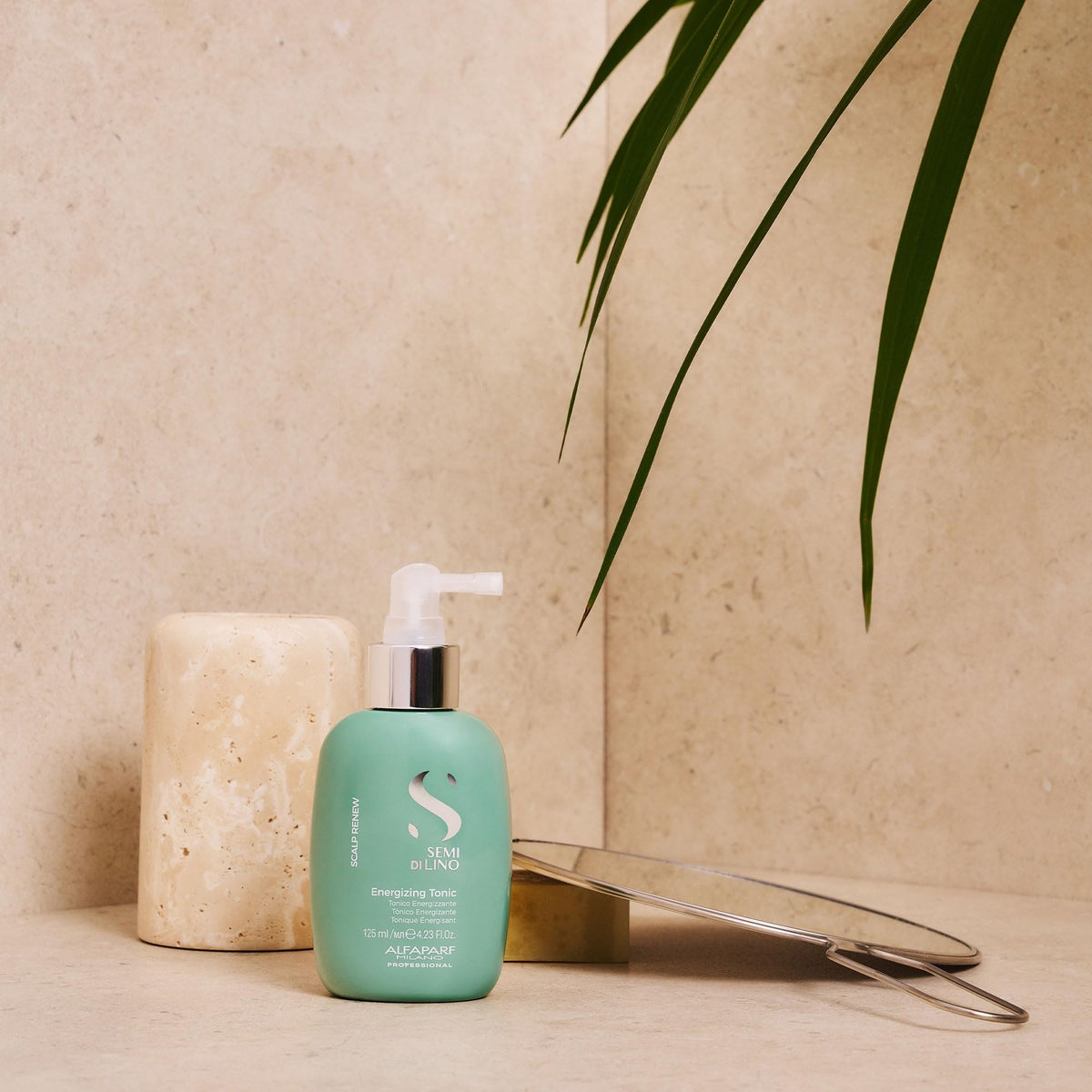 Alfaparf Milano tonic texture close-up displaying lightweight liquid for non-greasy finish