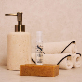Alfaparf Milano lotion droplet texture demonstrating lightweight spreadability