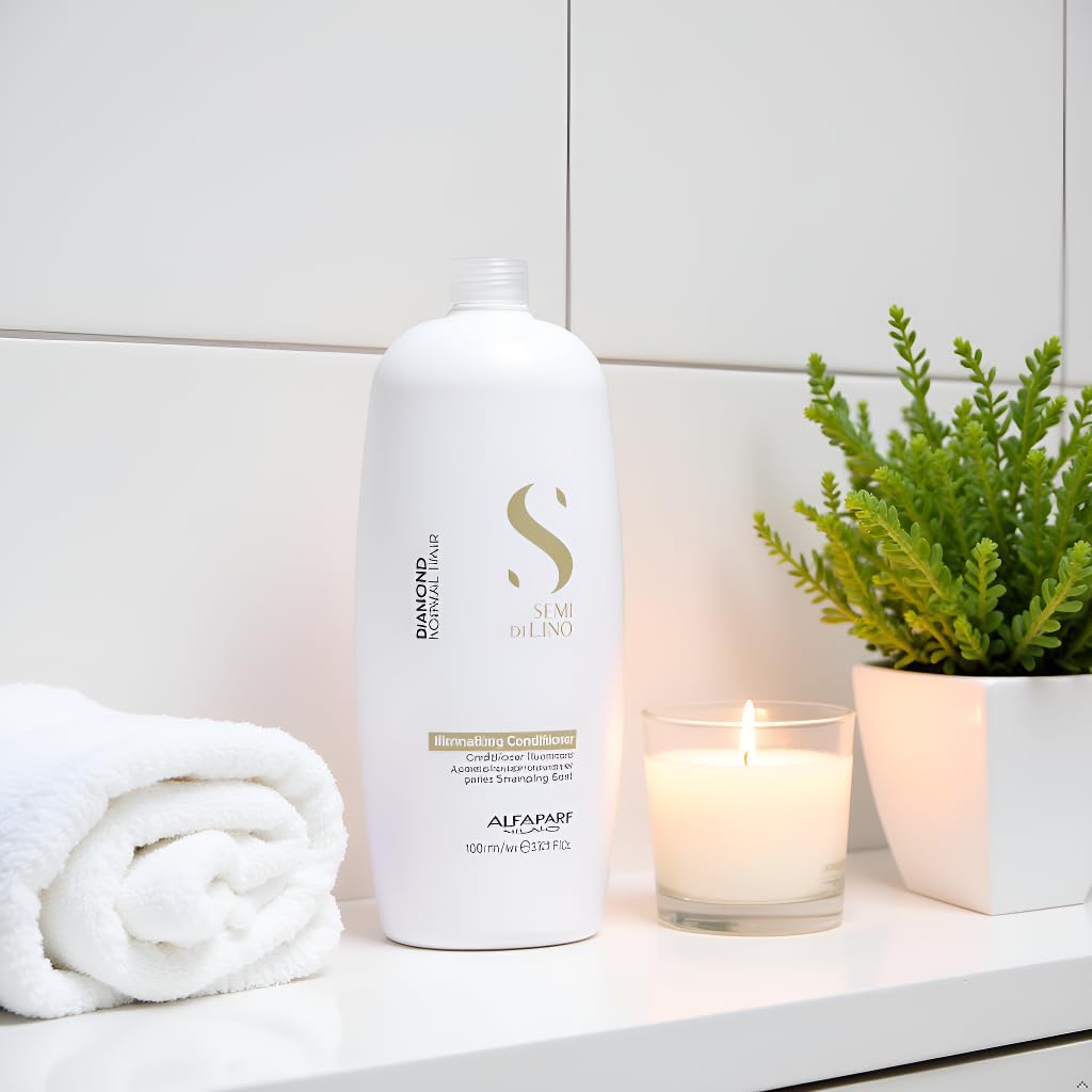 Alfaparf Milano conditioner applied to wet hair demonstrating slip for smoother combing and reduced breakage