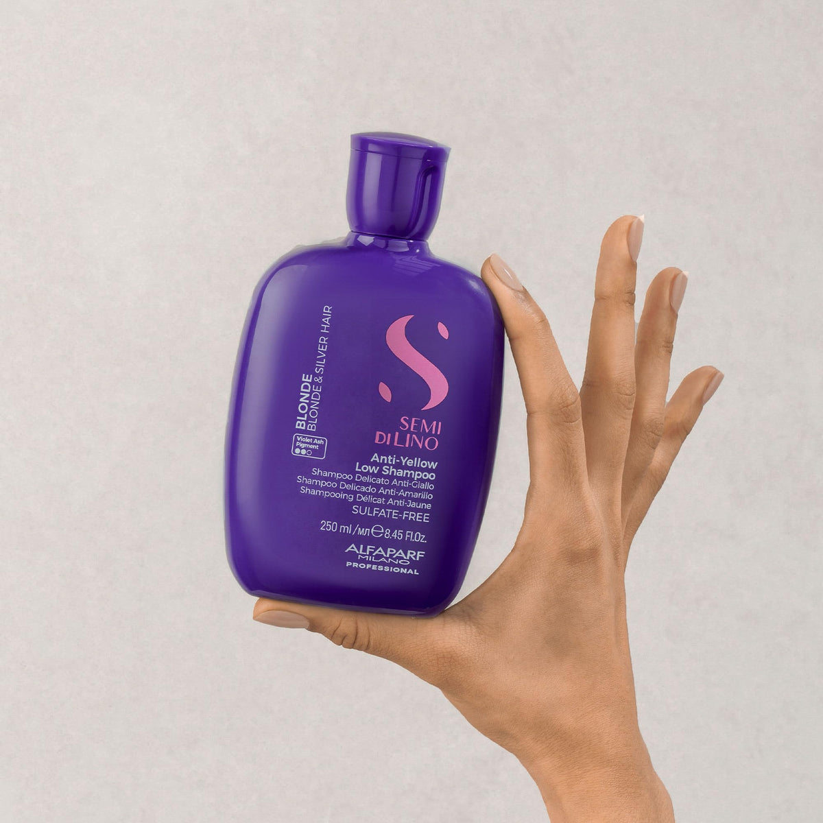 ALFAPARF MILANO shampoo applied to blonde hair demonstrating brassiness removal
