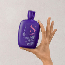 ALFAPARF MILANO shampoo applied to blonde hair demonstrating brassiness removal