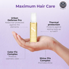 Beauty Nation USA pouring oil from an Alfaparf vial into hand demonstrating easy application