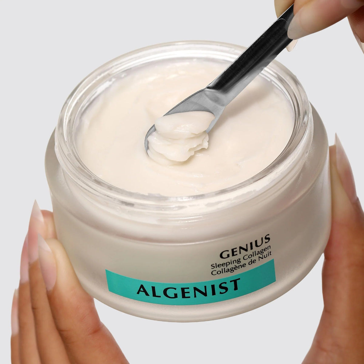 Algenist open jar top view showing creamy consistency and easy fingertip access
