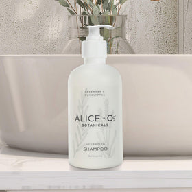 Alice + Co. bottle on hotel sink showing premium guest-experience benefit