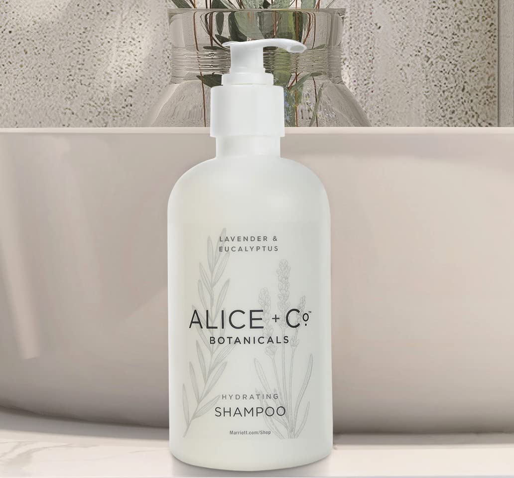 Alice + Co. bottles on hotel vanity conveying ready-to-use guestroom convenience