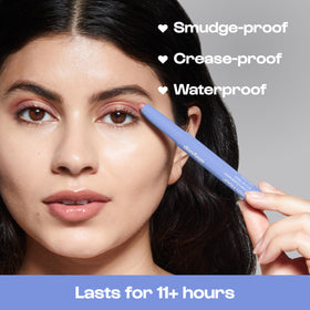 Model applying ALLEYOOP on eyelid for a natural daytime sheen benefit