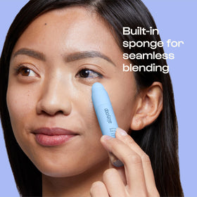 ALLEYOOP under-eye application on model illustrating crease-proof brightening benefit