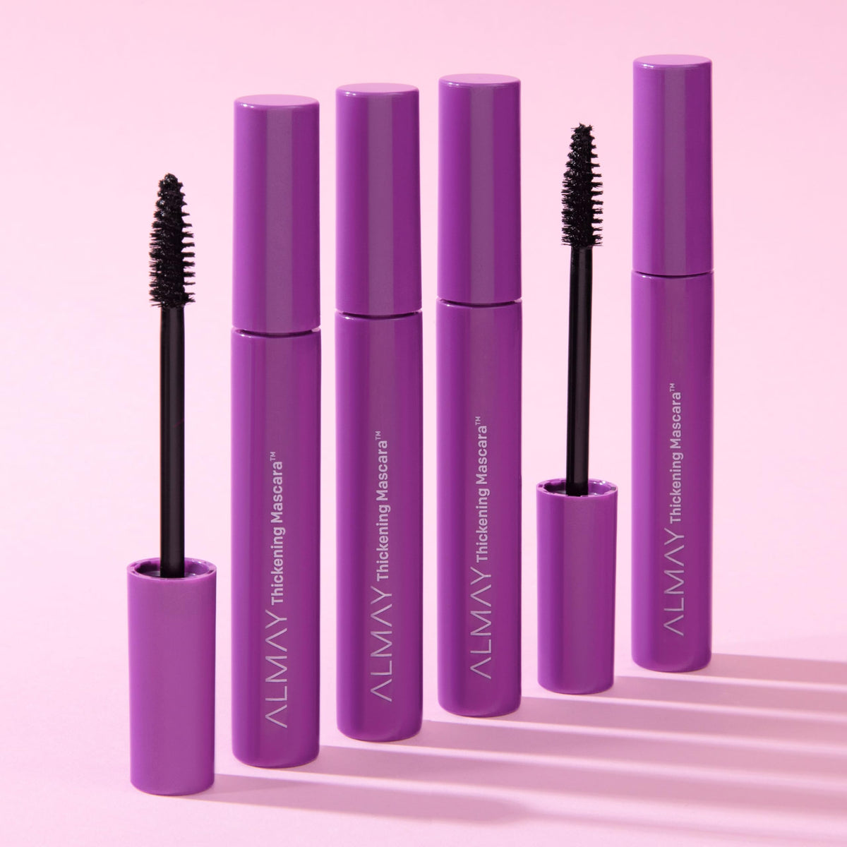 Almay mascara on lashes in use displaying lifted volume and length benefit