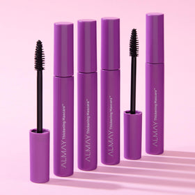 Almay mascara on lashes in use displaying lifted volume and length benefit