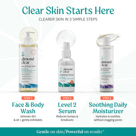 Almond Clear bottle held in hand showing 1 fl oz travel-friendly size